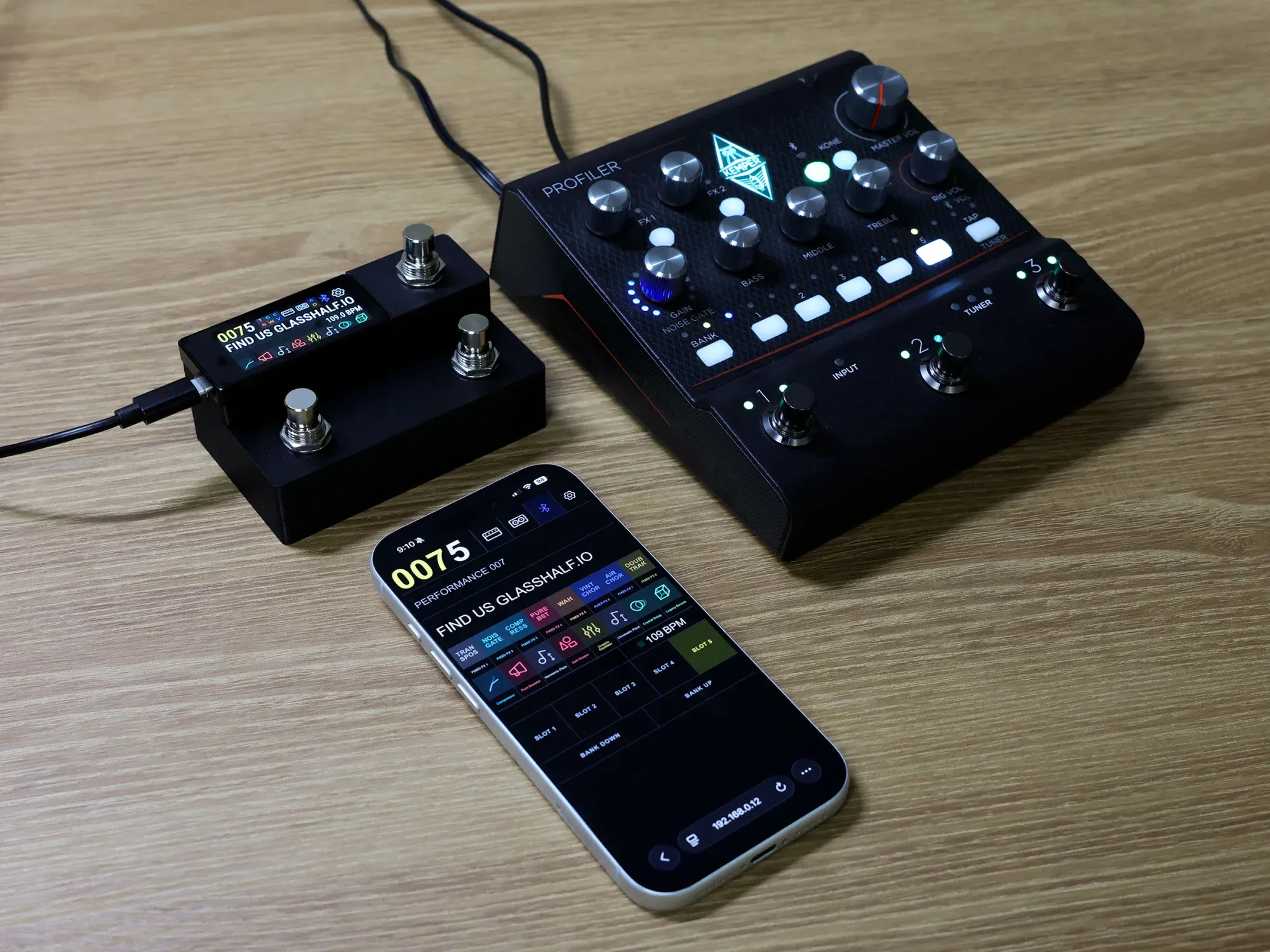 A phone displaying MAKIO local web controls beside a MAKIO controller and connected equipment.